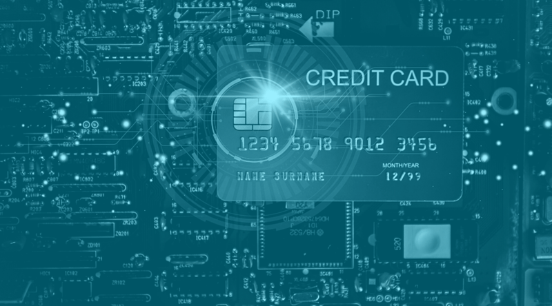 Credit card superimposed over motherboard